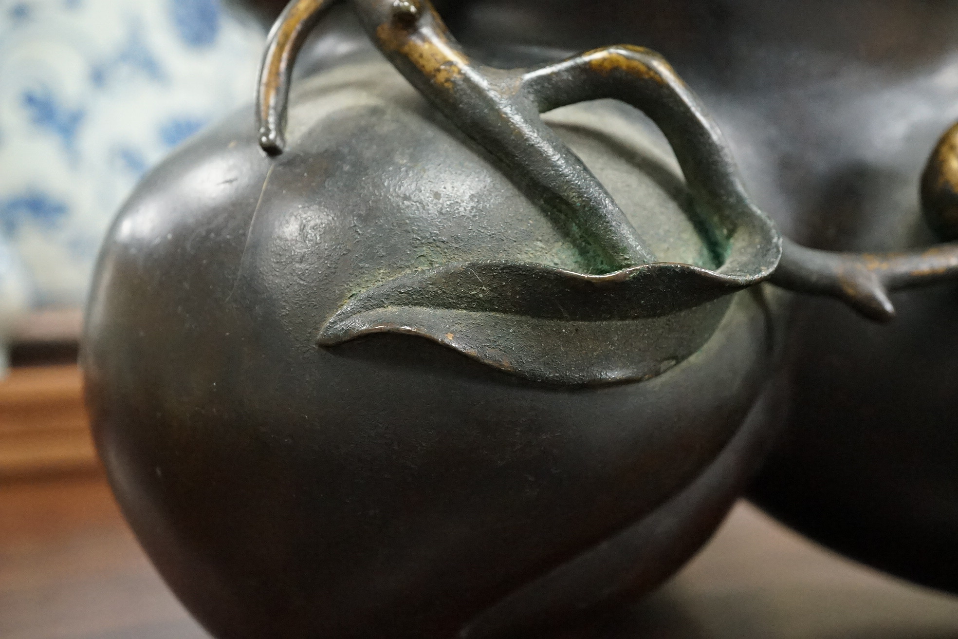 A large Chinese bronze and parcel gilt ‘peach’ censer and cover, Li, 17th/18th century